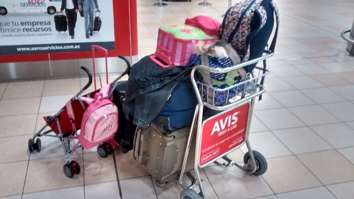 baggage cart with all of our luggage